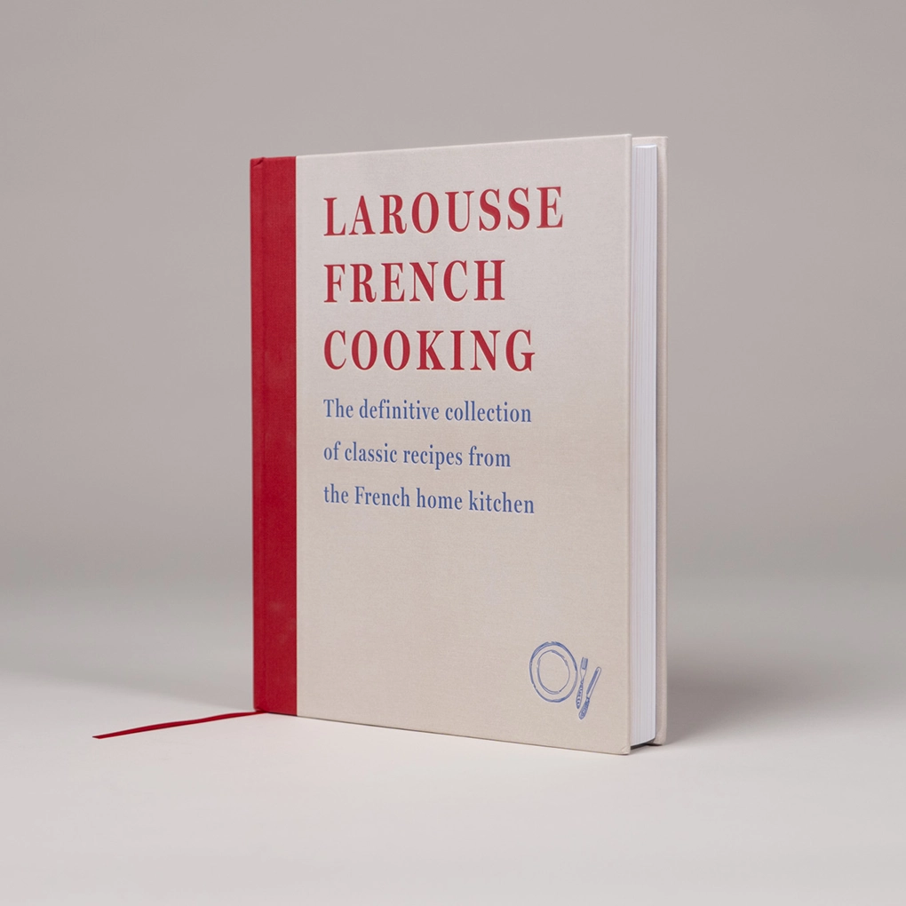 Larousse French Cooking, angled to show the dimensions of the edition